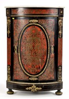 Lot 927 - A 19th Century French bowfront ebonised corner...