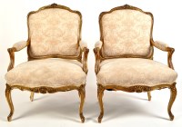 Lot 967 - A pair of Louise XV style giltwood armchairs,...